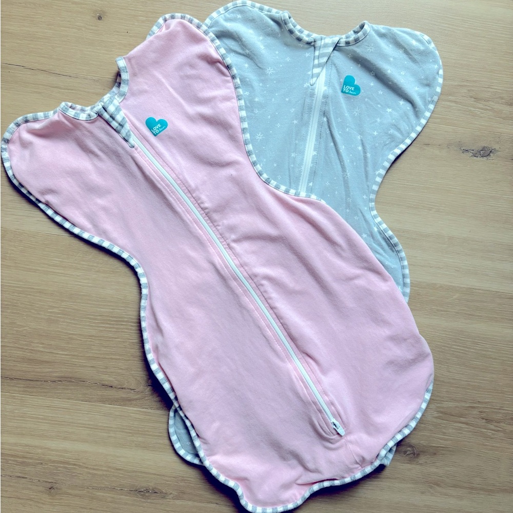 Love to dream swaddles. Qty 2, one pink & one grey stars. Size Small 8-13lbs